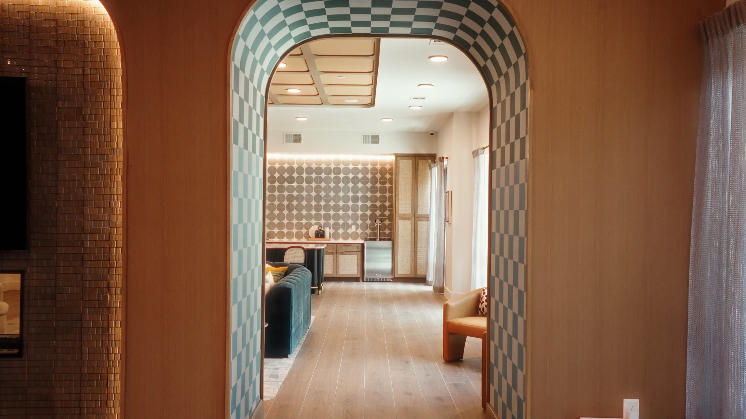 Checkerboard archway into the resident lounge at Merrick on Midway