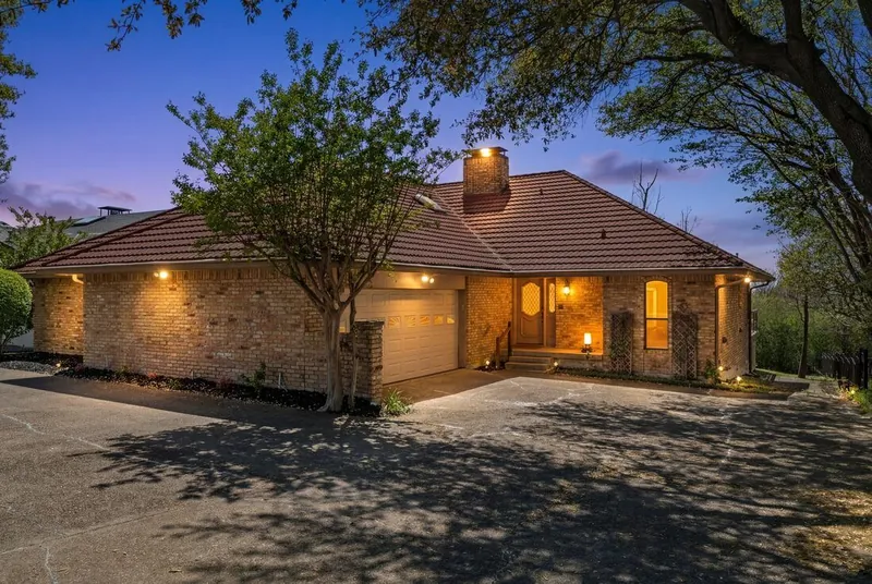 Waterfront home at twilight, Yacht Club, Dallas